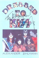 Dressed To Kiss Cover signed by Paul Stanley