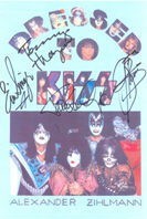 Dressed To Kiss Cover signed by Kiss 2008